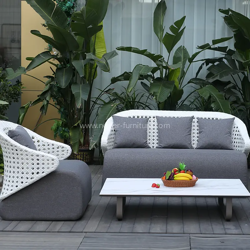 How Does a Rattan Outdoor Sofa Compare to Other Patio Furniture Materials