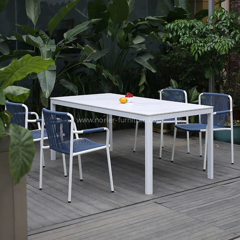 Does an Aluminum Woven Belt Outdoor Table and Chair Set Come with Cushions and Storage